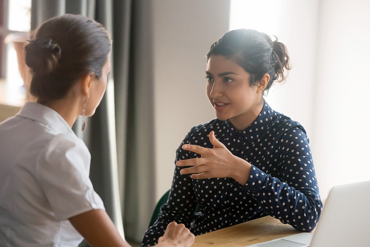 Two women talking