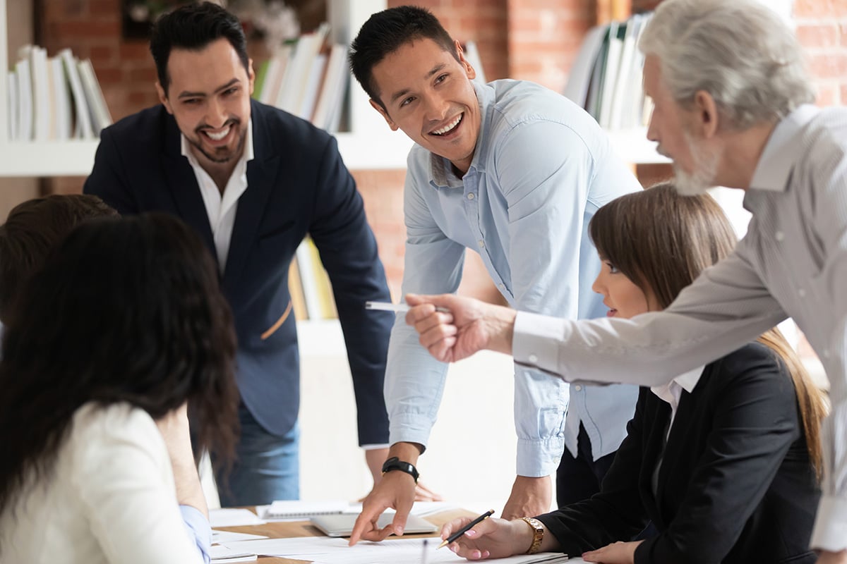 Group of employees laughing