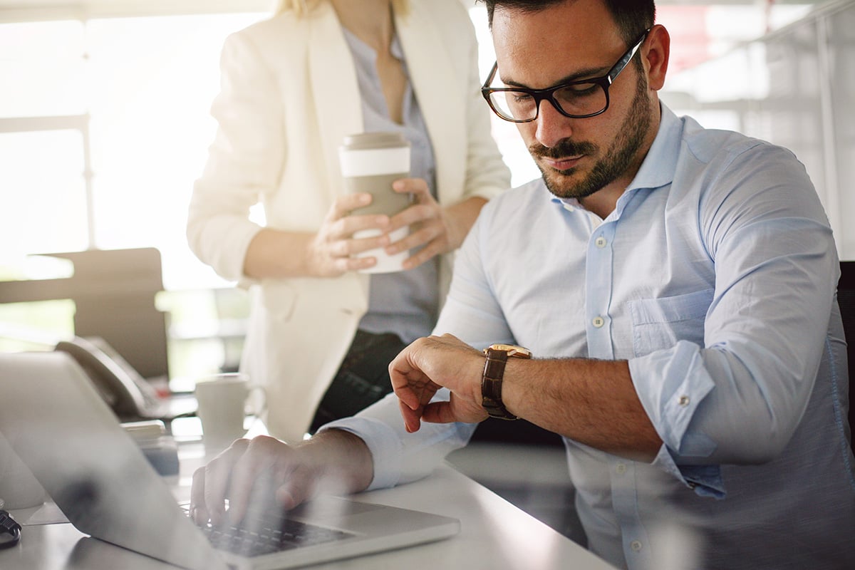 How to Be Selfish With Your Time, Without Being a Jerk: Man looking at his watch