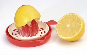 Lemon squeezer with a half lemon